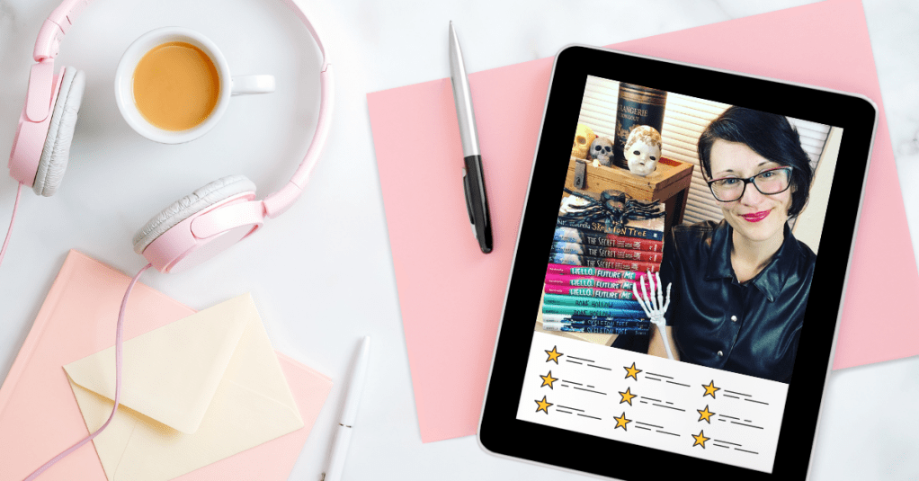 Decorative image of a desk top with tablet and headphones.